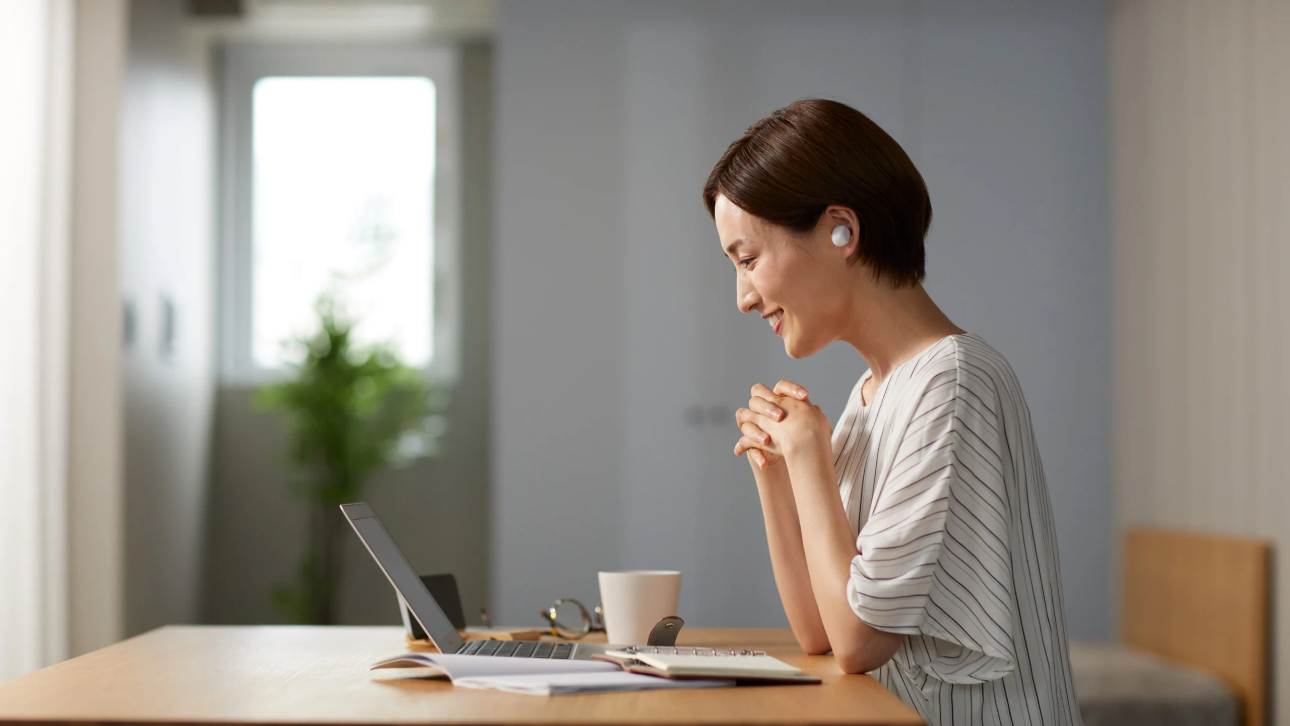 Small business owner reviewing rising compensation costs in 2026