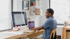 Remote call center agent handling inbound customer calls from a home office
